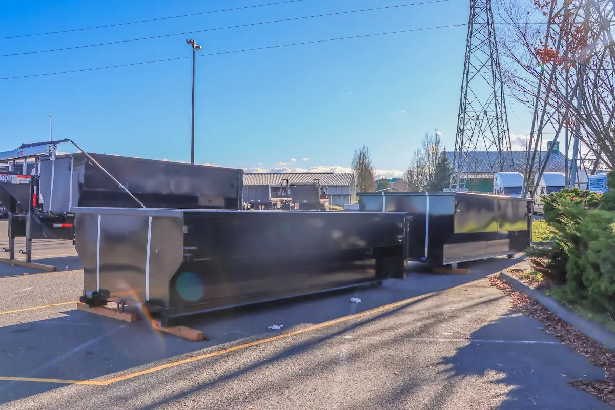 Roll-off dumpster ready for waste disposal at job site for 12 Yard Dumpster Rental in George Mason